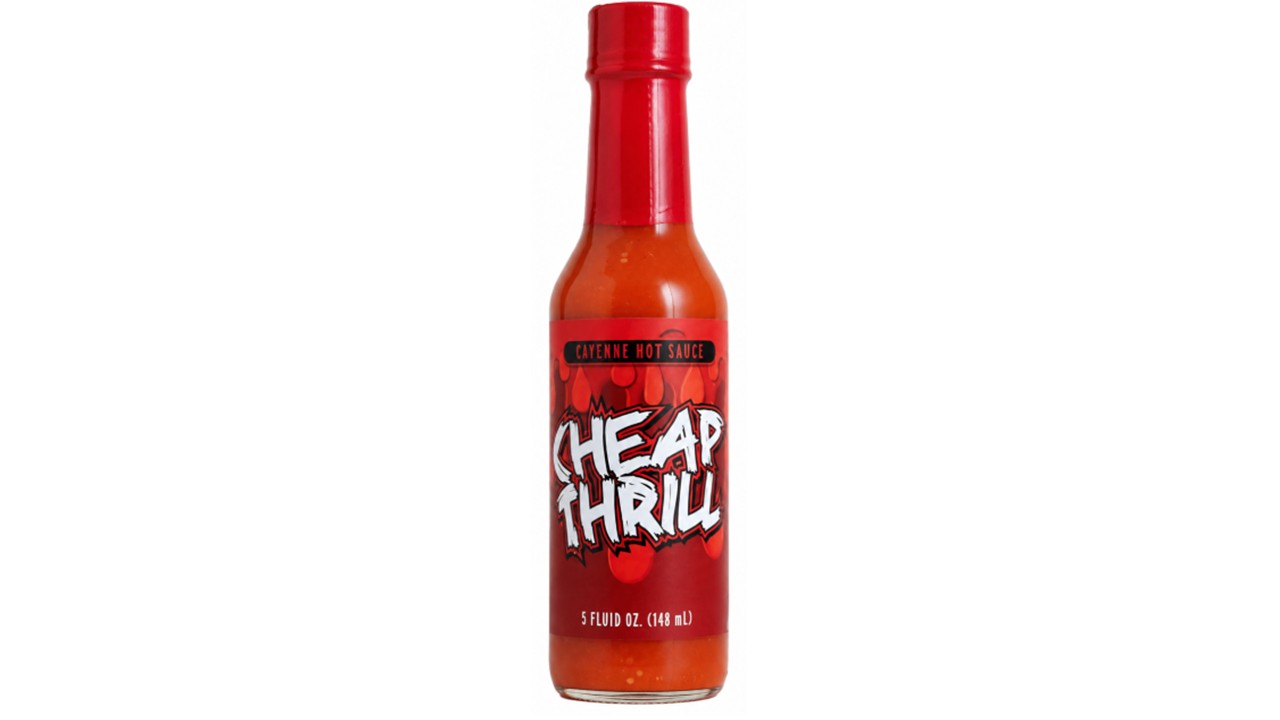 Cheap Thrill Cayenne Hot Sauce bottle on a white background