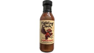 Bottle of Fighting Cock Kentucky Bourbon Barbeque Sauce with smoky bourbon flavor and rich Southern BBQ seasoning