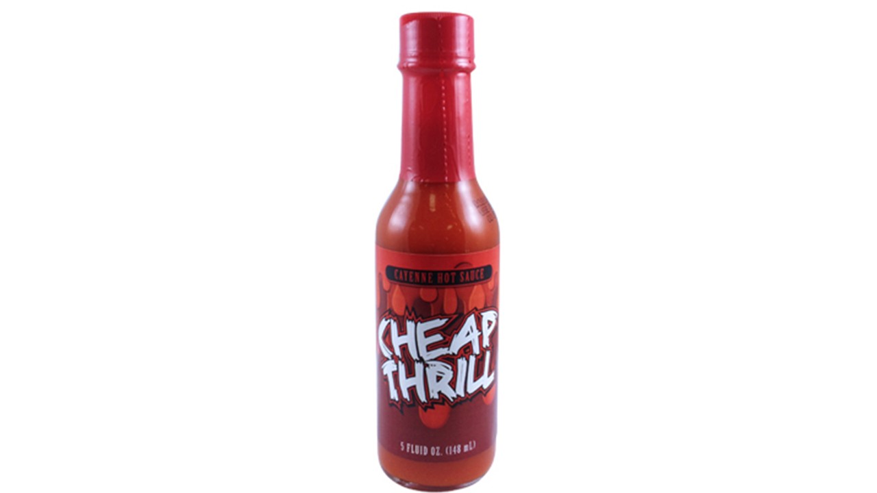 cheap thrill cayenne hot sauce spicy red sauce bottle bold everyday heat flavor