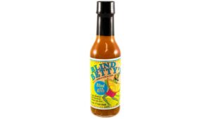 Blind Betty Blind in the Rind Hot Sauce bottle with citrus-forward flavor and spicy pepper heat ideal for seafood chicken and tropical recipes
