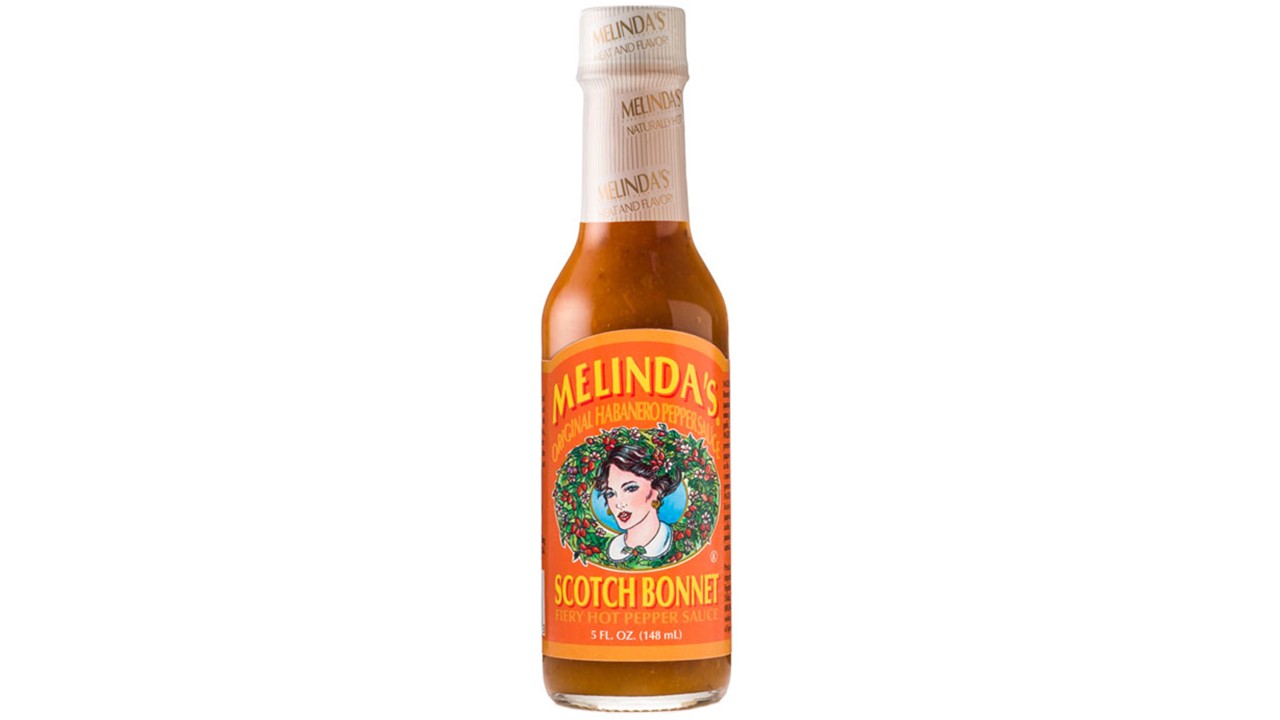 Melinda’s Scotch Bonnet fiery hot pepper sauce bottle with Caribbean style heat and bold pepper flavor