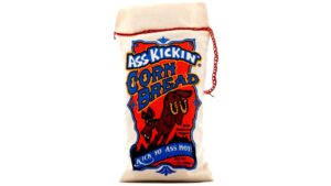 Ass Kickin’ Corn Bread Mix served with spicy BBQ food, chili, smoked meats, and hot sauce at a Southern-style backyard cookout