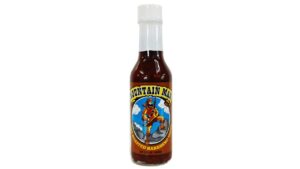 Mountain Man Fire Roasted Habanero Hot Sauce bottle with smoky habanero peppers and bold rustic spicy flavor branding from Peppers of Key West