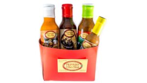 Peppers of Key West grill pack featuring jerk, Asian, chicken wing and banana hot sauces for grilling and flavor variety