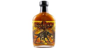 Hellhound Ghost Pepper Mustard Hot Sauce bottle featuring fiery ghost pepper heat blended with bold mustard flavor.