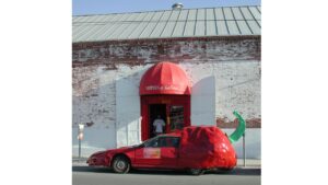 Historic Peppers of Key West storefront with the original pepper car parked outside