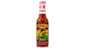 Iguana Red Cayenne Pepper Hot Sauce bottle with bold Caribbean-style cayenne pepper sauce