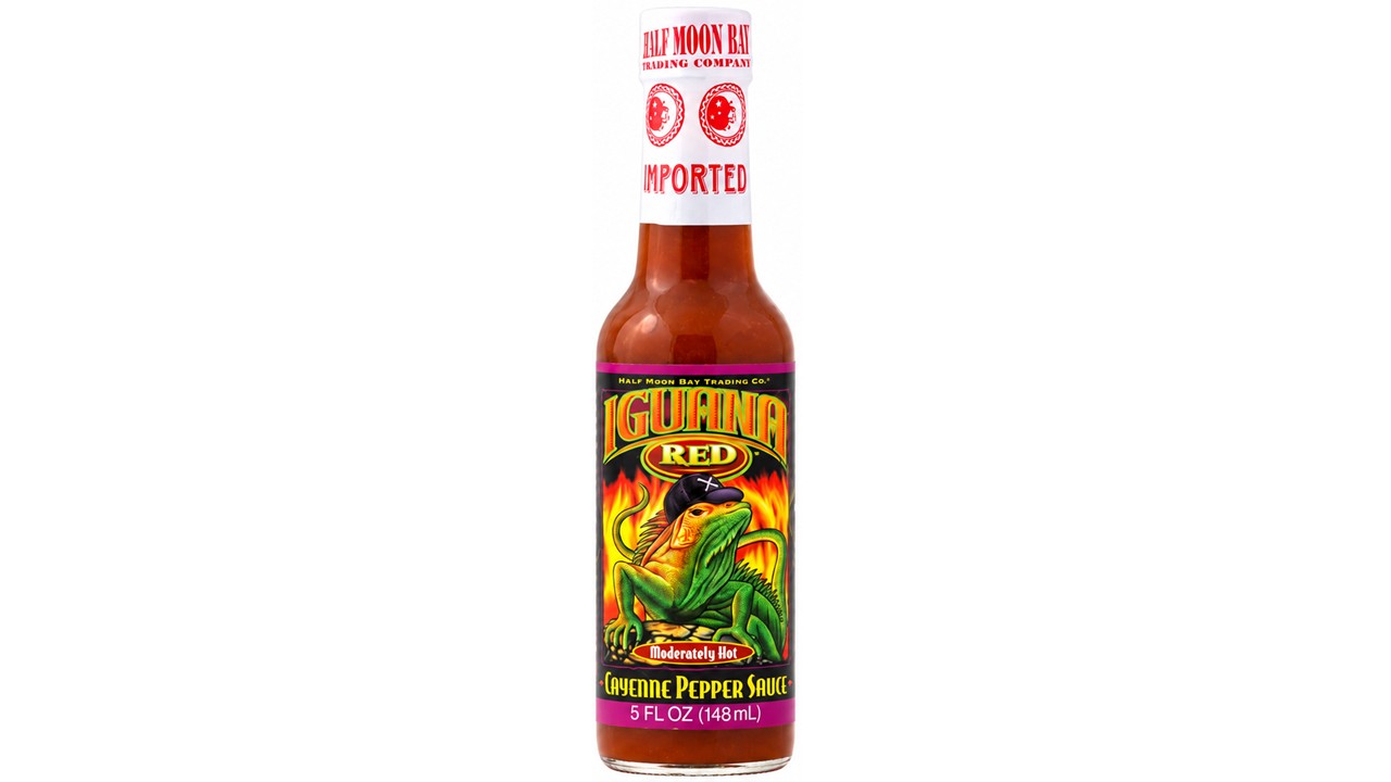 Iguana Red Cayenne Pepper Hot Sauce bottle with bold Caribbean-style cayenne pepper sauce