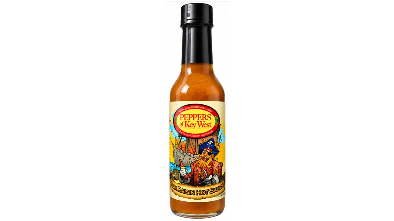 Peppers of Key West Tropical Rum, Pineapple & Raisin Hot Sauce bottle